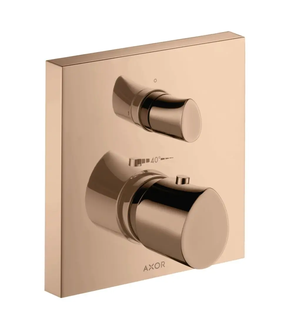 Thermostat mit zwei Reglern zur Temperatur- und Wassermengensteuerung, montiert auf einer quadratischen Wandplatte in Polished Red Gold, von der Marke AXOR.